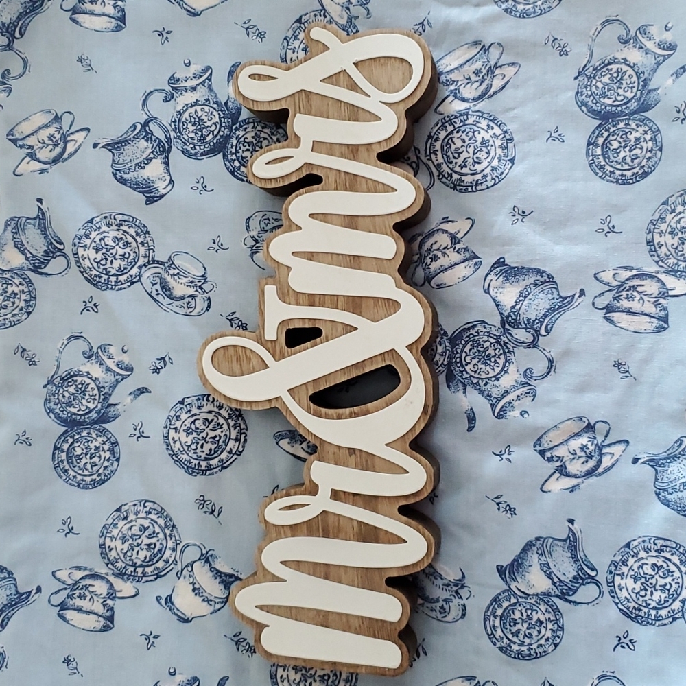 "Mr. & Mrs." wooden cutout decoration sign